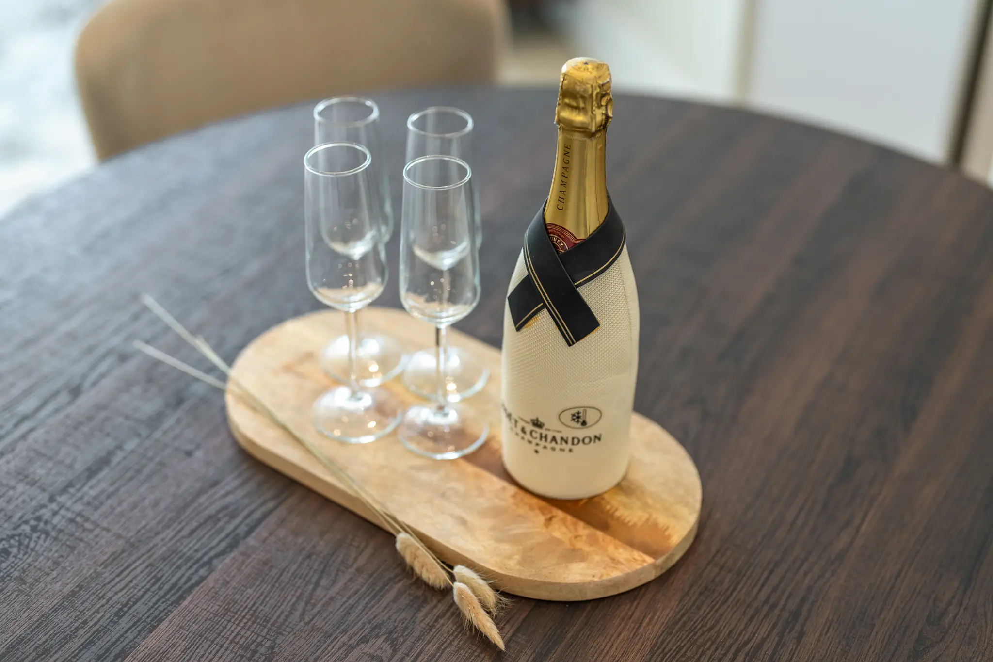 Champagne bottle prepared for a resident move-in at a Lotus Living apartment